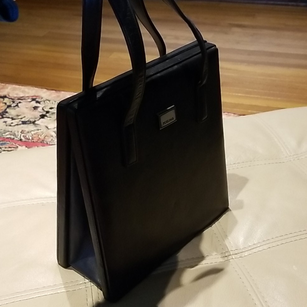 Perlina black hard "A" frame leather handbag